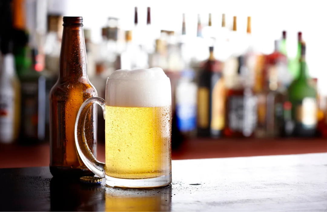 A frosty mug of draft beer at the bar